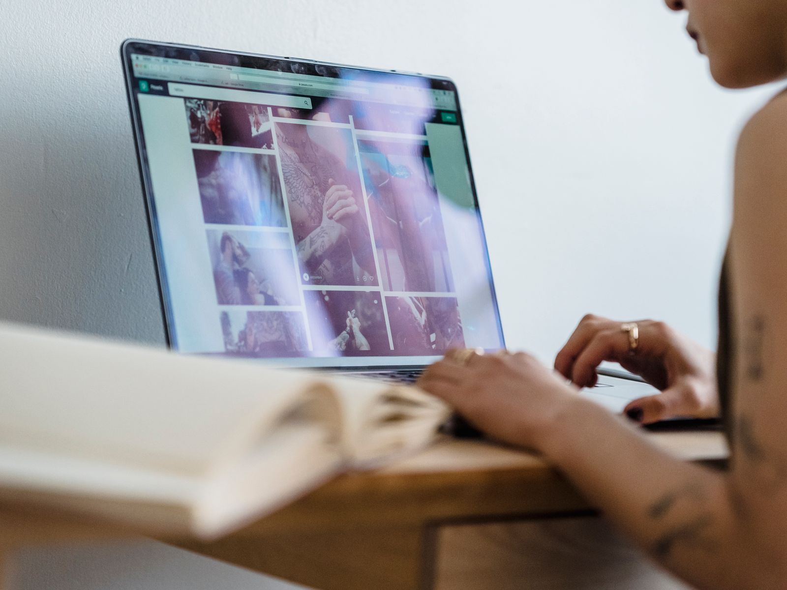 Person reviewing and backing up rental move-in photos on a laptop