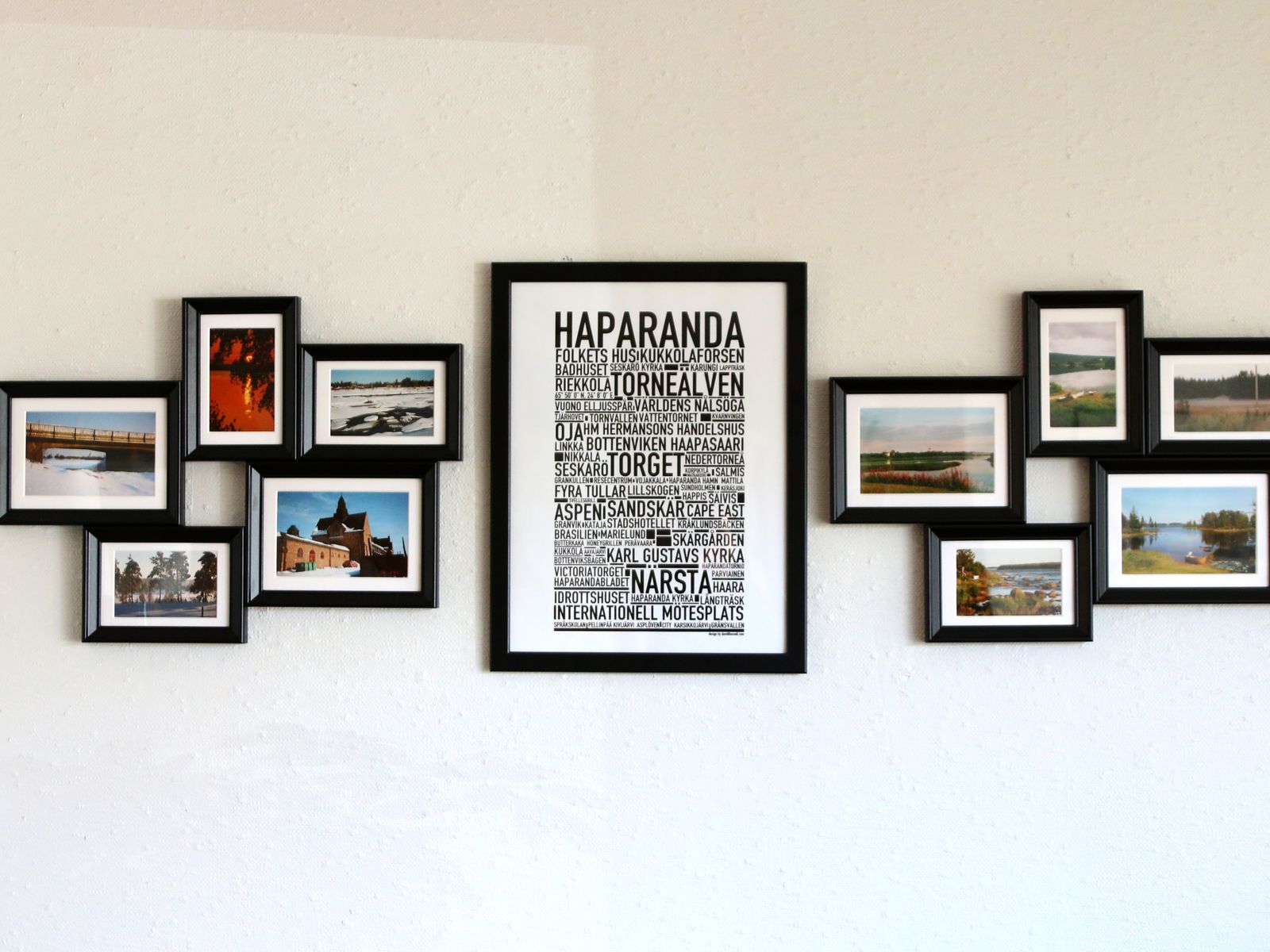Hang pictures without drilling using black frames on a rental wall