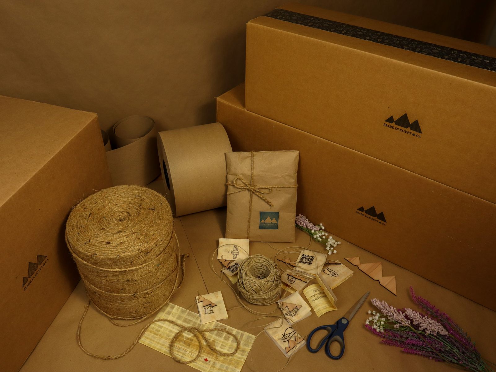 Boxes, kraft paper, and twine as cheap and free packing materials for moving