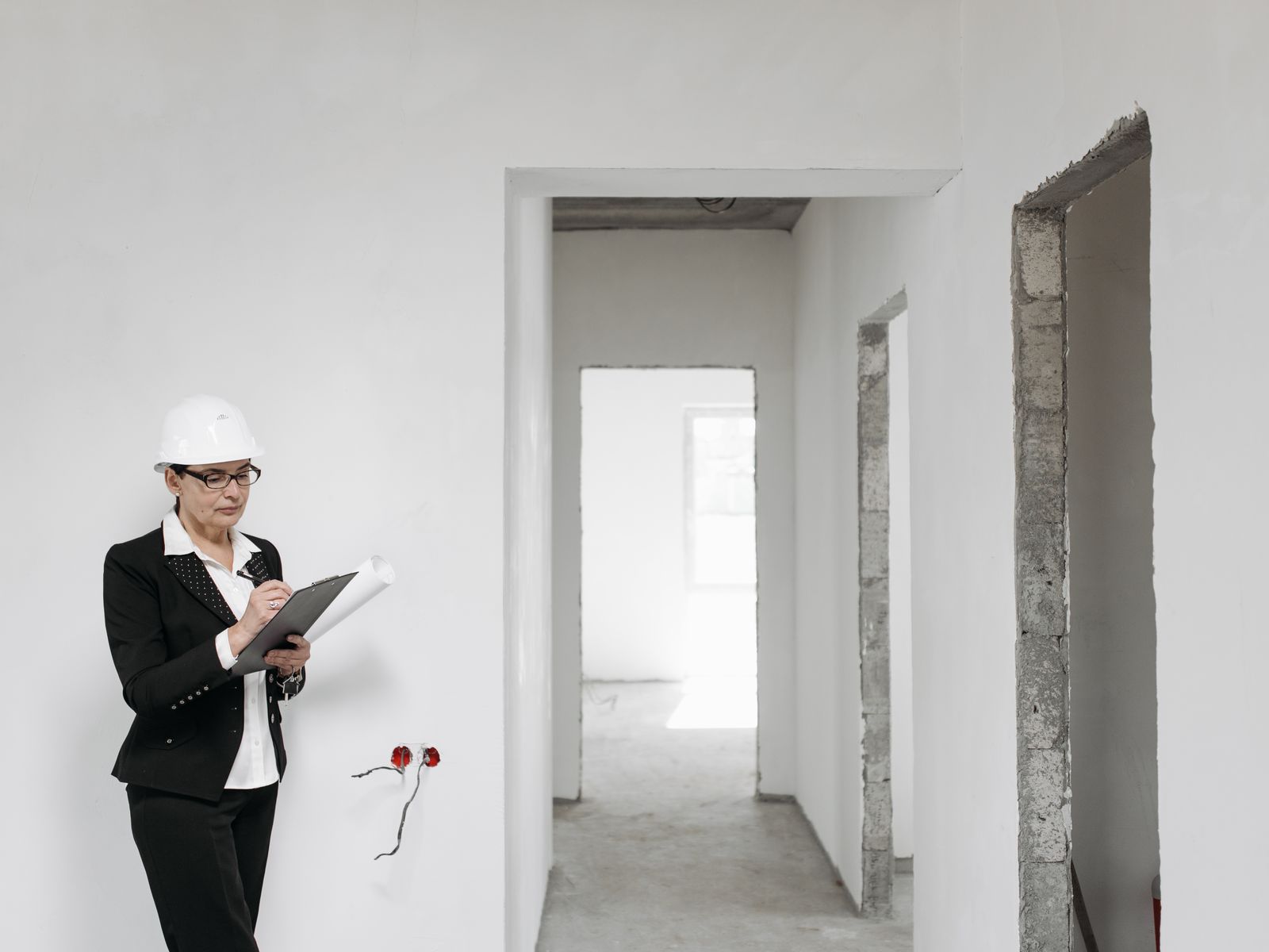Checking walls and finishes during a move-in inspection