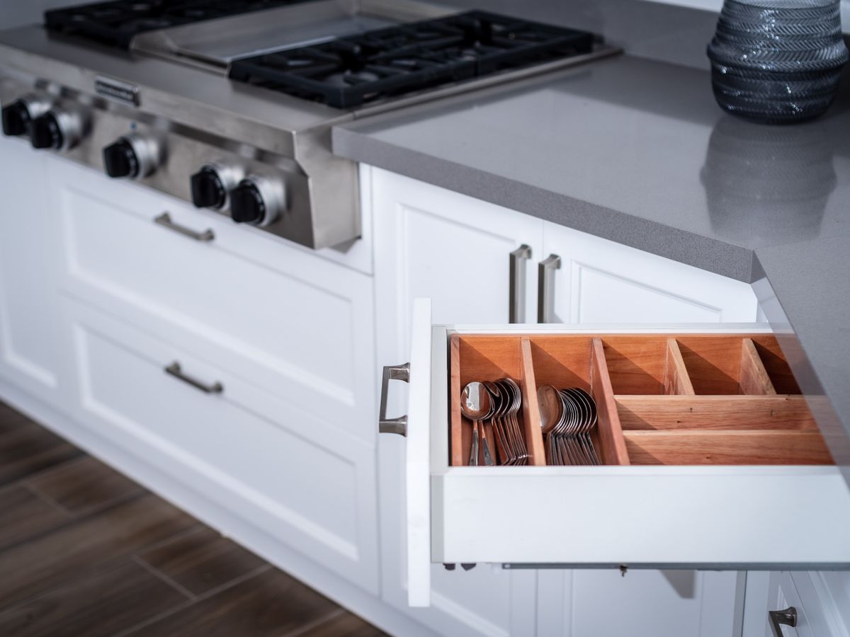 Modern kitchen drawer and cabinets to childproof a rental without screws