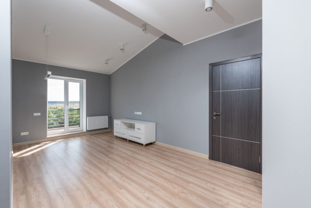 Empty rental apartment room with hardwood floors ready to document your rental condition