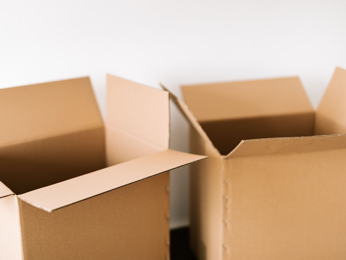 Open cardboard boxes ready for packing fragile items at home
