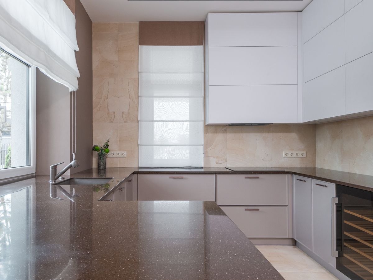 A clean rental kitchen counter, a common place to fix minor rental damage like burns and chips