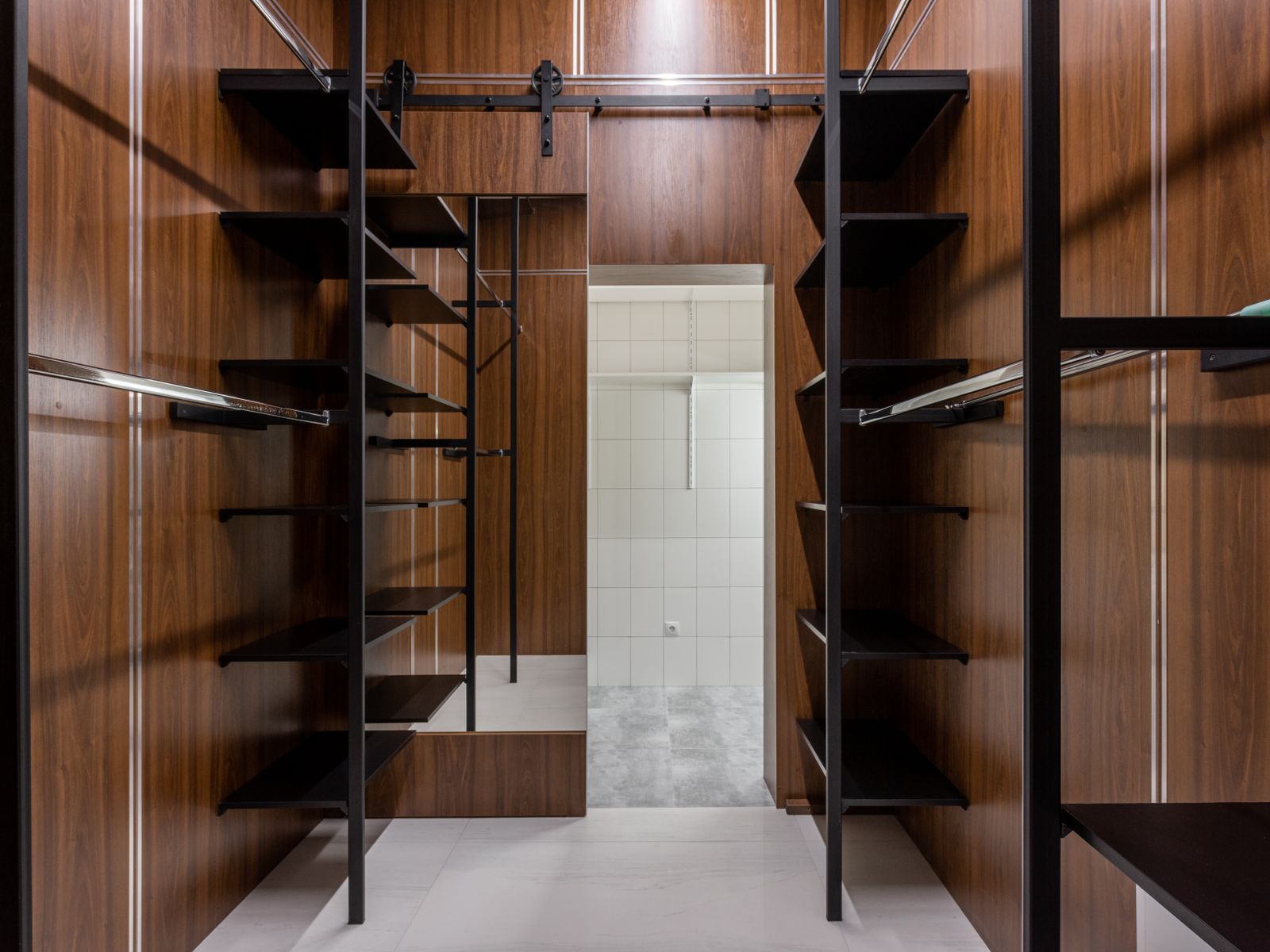 vertical shelving adding storage in a rental closet