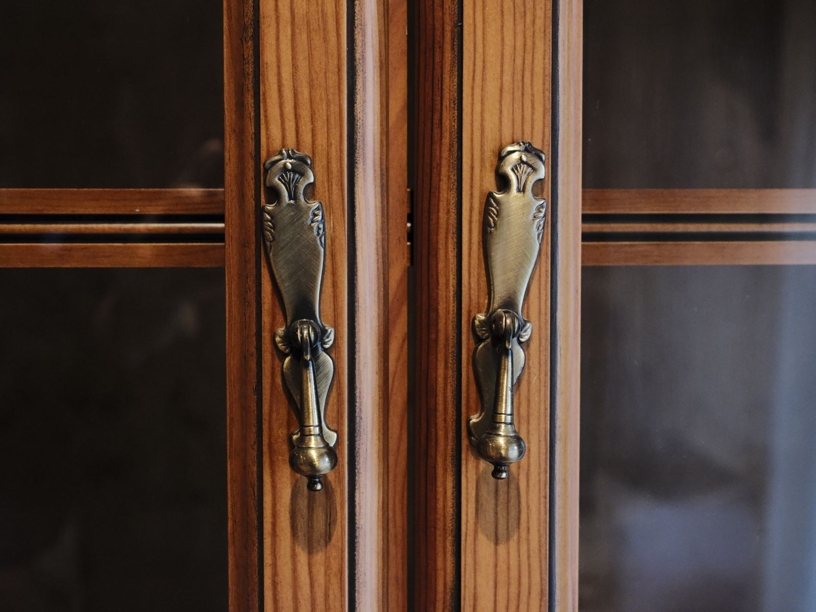 Brass cabinet handles swapped onto rental kitchen cabinets