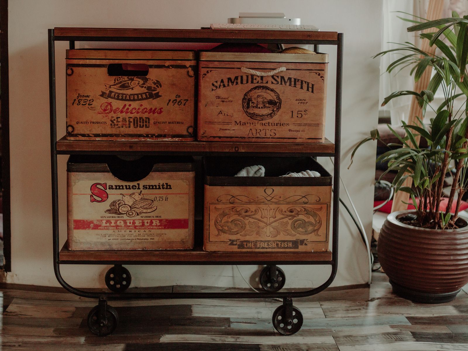 Rolling cart offering vertical storage without touching the walls